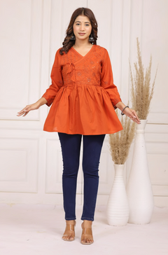 Elegant cotton embroidered peplum top