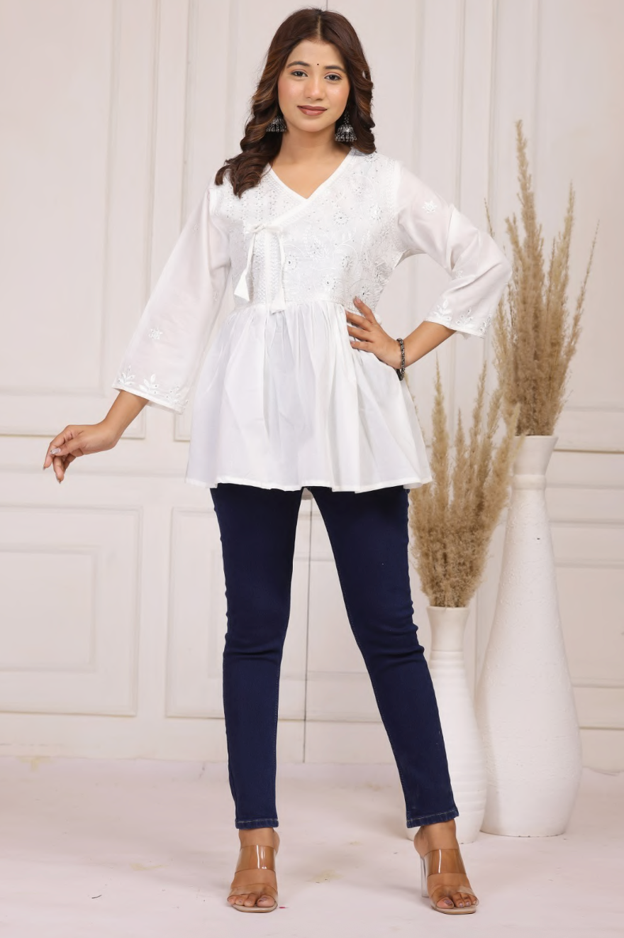 Elegant cotton embroidered peplum top