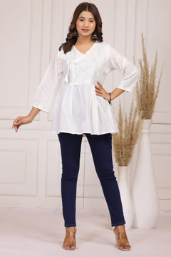 Elegant cotton embroidered peplum top
